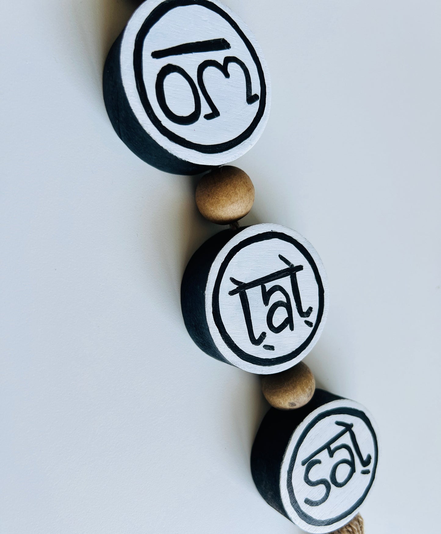 om tat sat round hanging